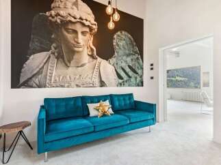 This stunning property boasts a modern living space with a touch of artistic flair.