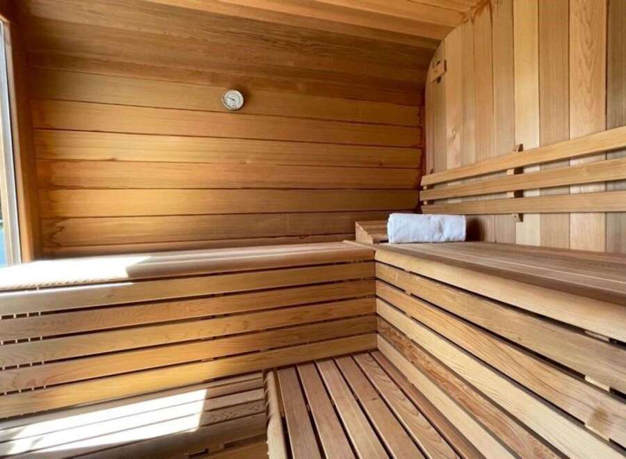 Step into relaxation with this stunning sauna, designed for ultimate comfort and rejuvenation.