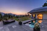 Experience luxury living with this stunning mountain view property featuring a private pool and expansive patio.