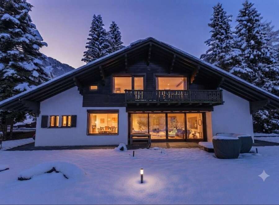 Experience luxury mountain living in this stunning chalet, nestled amidst snow-covered pines and majestic peaks.