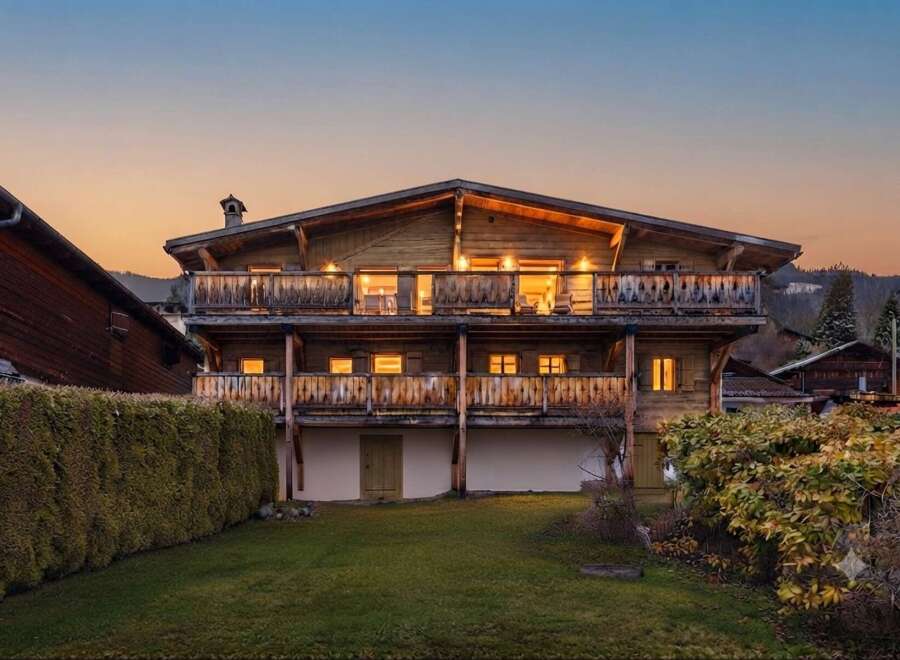 Experience the charm of this rustic wooden chalet, nestled amidst a serene mountain landscape.