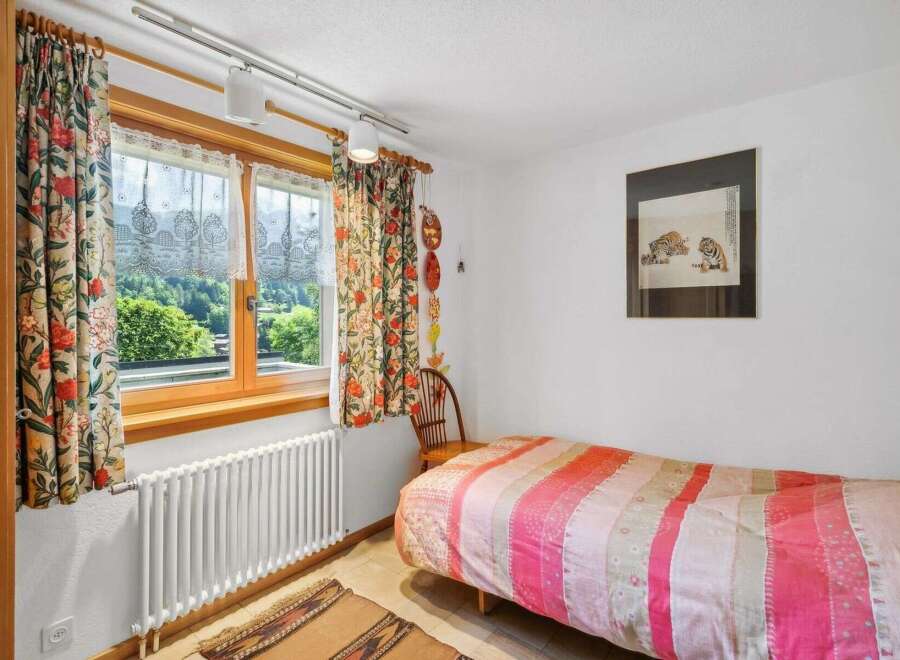Charming bedroom with a cozy atmosphere.