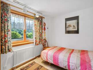 Charming bedroom with a cozy atmosphere.