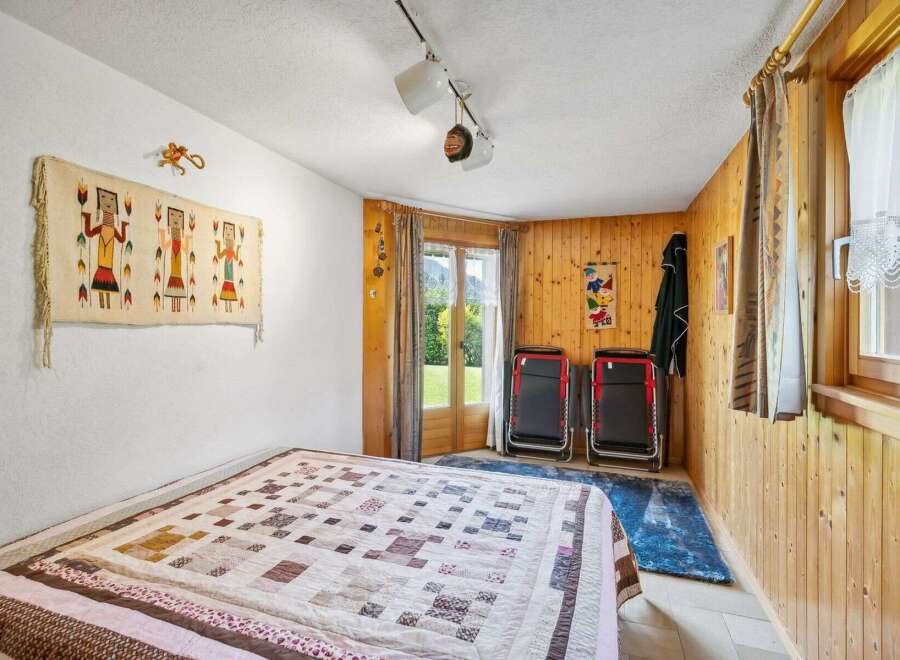 Cozy bedroom with a rustic charm.