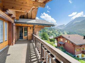 Experience breathtaking mountain views from this stunning chalet.