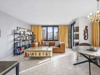 Discover the charm of this inviting living space, perfect for relaxation and entertaining.