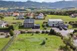 Discover this stunning property featuring a modern house with solar panels, offering sustainable living and energy efficiency.