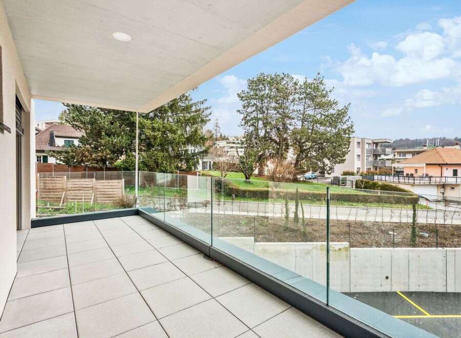 Enjoy breathtaking views from this modern balcony.