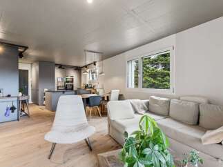 Discover modern living in this stunning property! Featuring a sleek, open-plan kitchen and dining area, perfect for entertaining.