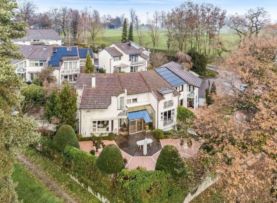 Discover this stunning property featuring a beautifully designed house with a charming patio area.