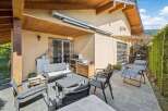 Enjoy outdoor living at its finest with this charming property featuring a covered patio.