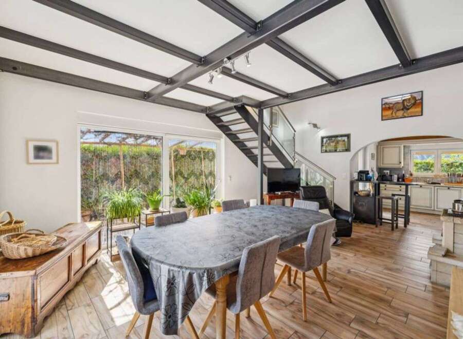 This stunning property boasts a modern open-plan design, perfect for entertaining.
