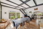 This stunning property boasts a modern open-plan design, perfect for entertaining.