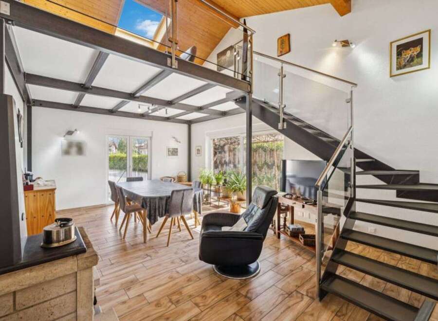 Discover this stunning property featuring a modern interior design with a unique mezzanine level.