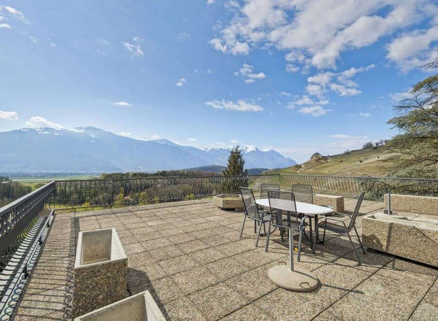 Enjoy breathtaking mountain views from this stunning property.