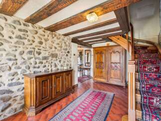 Step into a world of rustic charm with this stunning property.