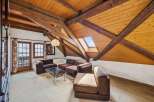 Discover the charm of this unique property featuring a stunning wooden beamed ceiling and a skylight that floods the space with natural light.