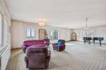 Step into luxury with this spacious living room, perfect for entertaining or relaxing.
