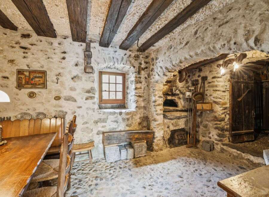 Step back in time with this charming stone-walled property, perfect for those seeking a rustic retreat.