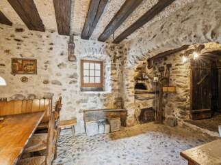Step back in time with this charming stone-walled property, perfect for those seeking a rustic retreat.