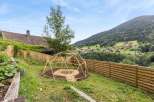 Discover a charming property with a unique geodesic dome structure, perfect for a garden or outdoor retreat.