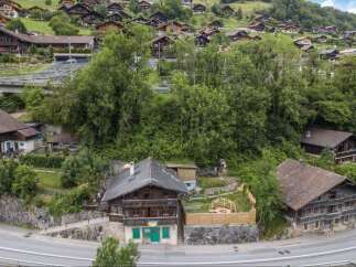 Nestled in a picturesque hillside village, this charming property offers a unique blend of rustic charm and modern convenience.