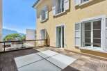 Enjoy breathtaking views from this stunning property, featuring a spacious balcony with a unique glass floor design.