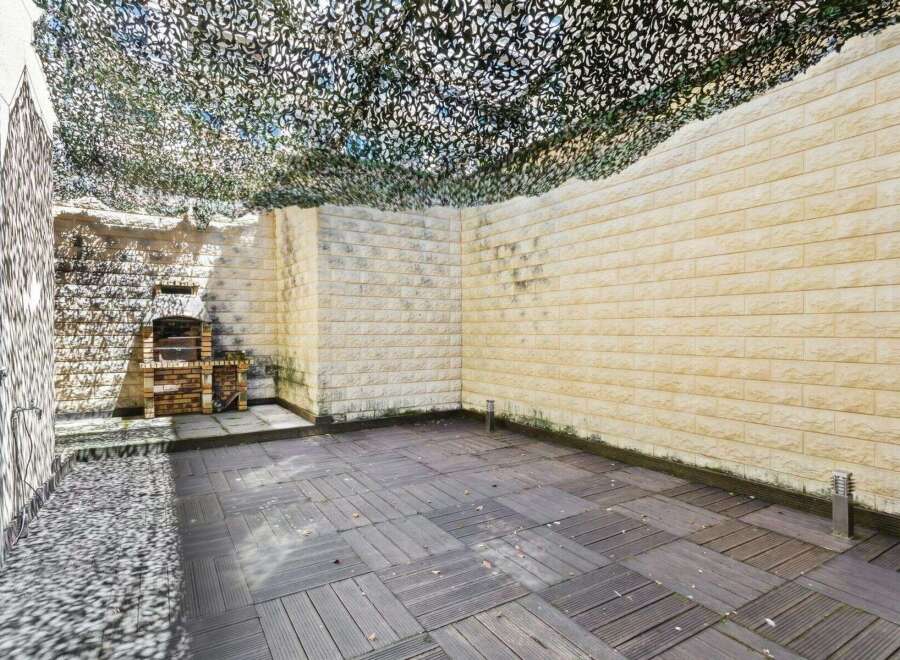 Discover the charm of this outdoor space, perfect for entertaining or relaxing.