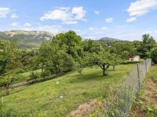 Discover the tranquility of this stunning property, offering breathtaking views of the surrounding mountains and lush greenery.