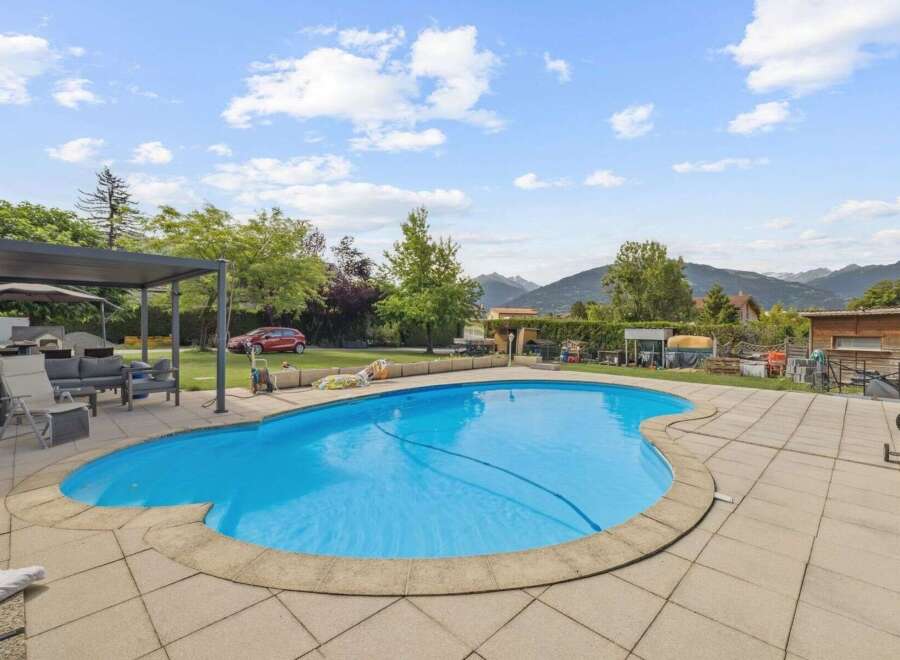 Enjoy the ultimate outdoor living experience with this stunning property! Featuring a beautiful pool, perfect for those hot summer days, and a spacious patio area ideal for entertaining.