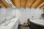 Step into luxury with this stunning bathroom featuring a modern design and high-end finishes.
