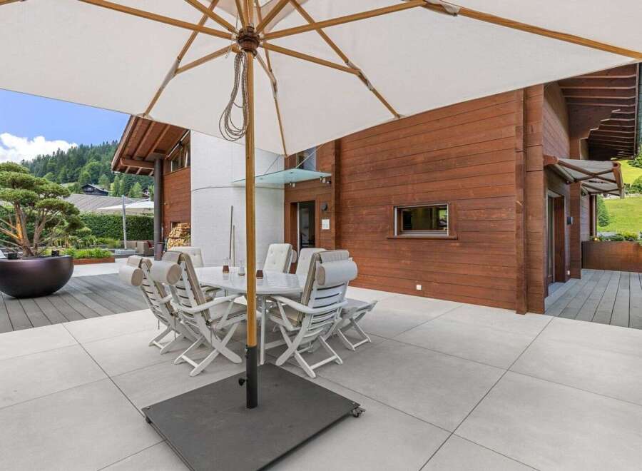 Experience luxury living in this stunning property, featuring a beautifully designed outdoor space perfect for entertaining.