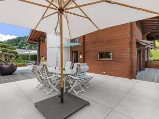 Experience luxury living in this stunning property, featuring a beautifully designed outdoor space perfect for entertaining.