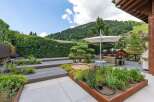 Experience luxury living with this stunning property featuring a beautifully landscaped outdoor space.