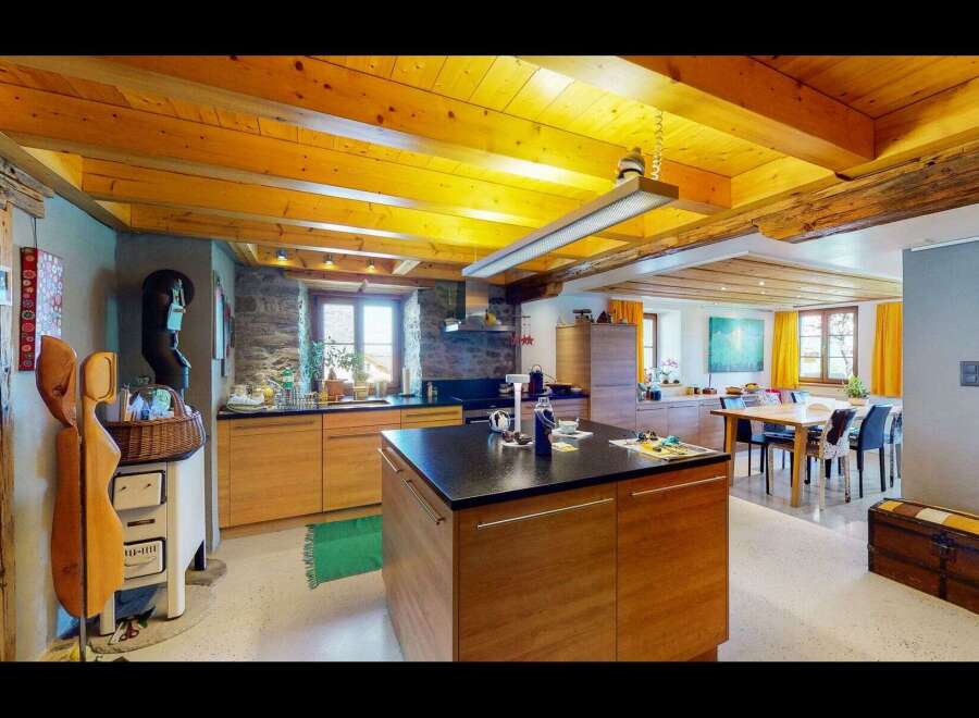 Step into this stunning kitchen, boasting a unique blend of rustic charm and modern design.