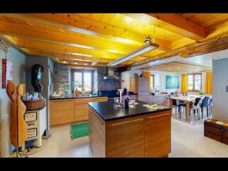Step into this stunning kitchen, boasting a unique blend of rustic charm and modern design.
