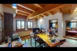 This charming property boasts a unique interior design with exposed wooden beams and a cozy atmosphere.