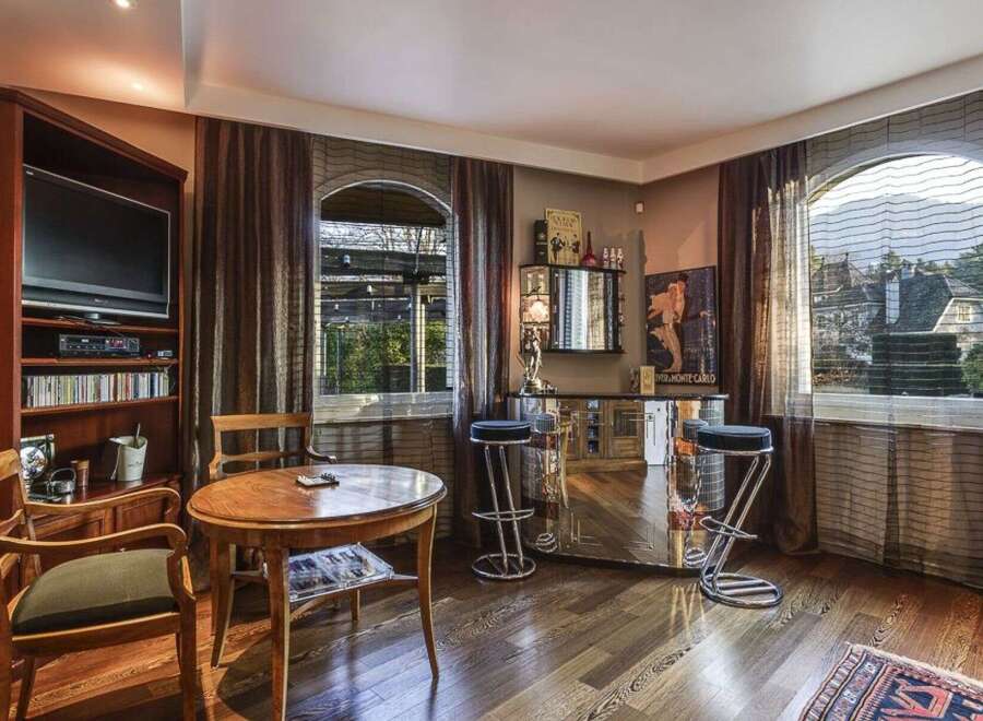 Step into luxury with this stunning property, featuring a sophisticated entertainment area.