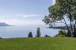 Enjoy breathtaking views of the lake and mountains from this stunning property.