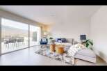 Experience luxury living with this stunning property, featuring a spacious living area with breathtaking mountain views.