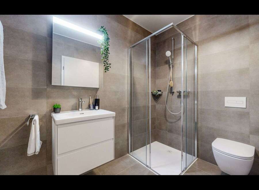 Step into modern elegance with this beautifully designed bathroom.