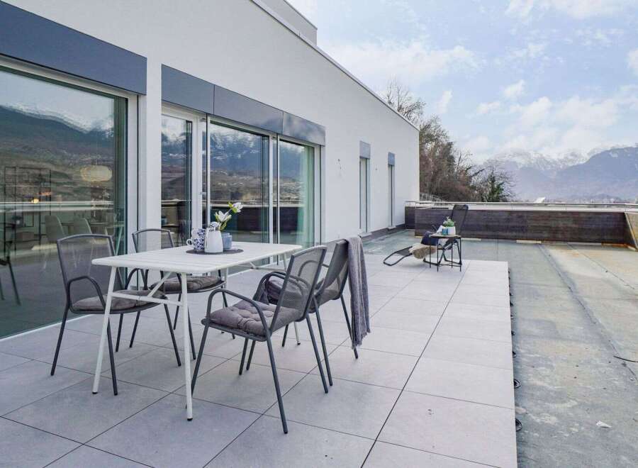 Enjoy breathtaking mountain views from this stunning rooftop terrace.