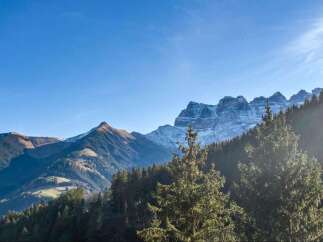 Experience breathtaking mountain views from this stunning property.