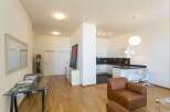 Discover modern living in this stylish apartment! Featuring a sleek kitchen with a breakfast bar, perfect for entertaining.