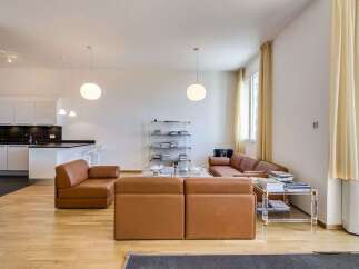 This stunning property boasts a modern open-plan living space, perfect for entertaining.