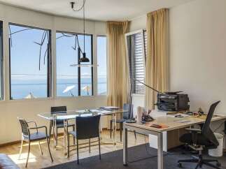 Experience breathtaking waterfront views from this stunning office space.