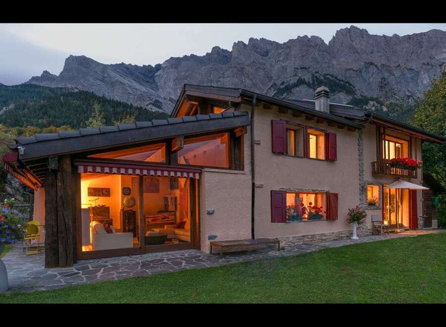 Discover the charm of this stunning mountain home, perfectly nestled against a backdrop of majestic peaks.