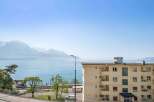 Enjoy breathtaking views from this stunning property! This residence boasts a prime location with panoramic vistas of the lake and majestic mountains.