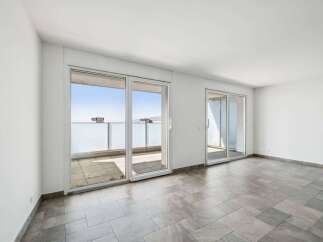 Discover this stunning property featuring expansive windows that flood the space with natural light.