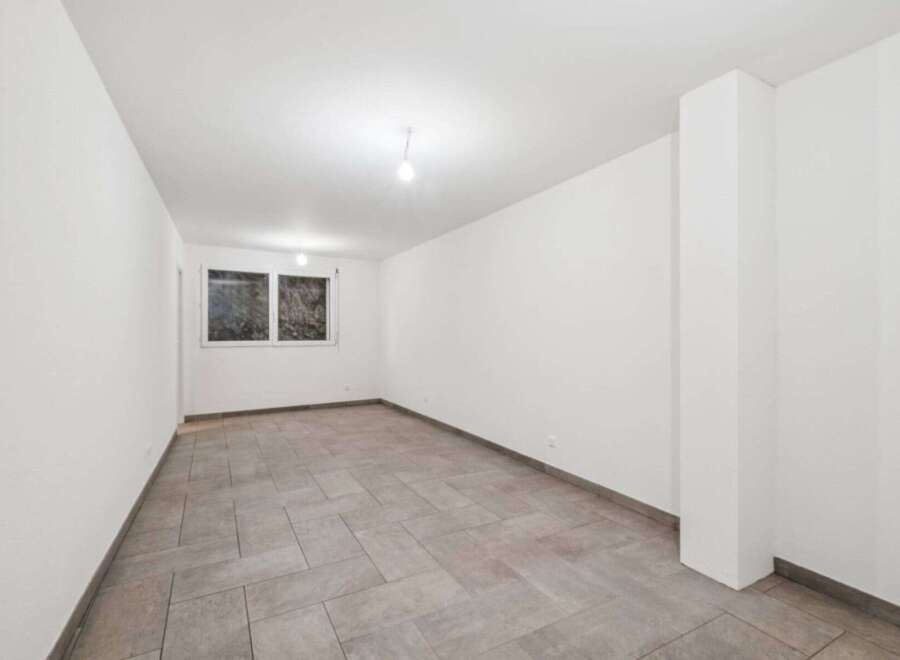 This spacious room offers a blank canvas for your design ideas.